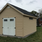 Hubertus gable with transom windows and glass in door option